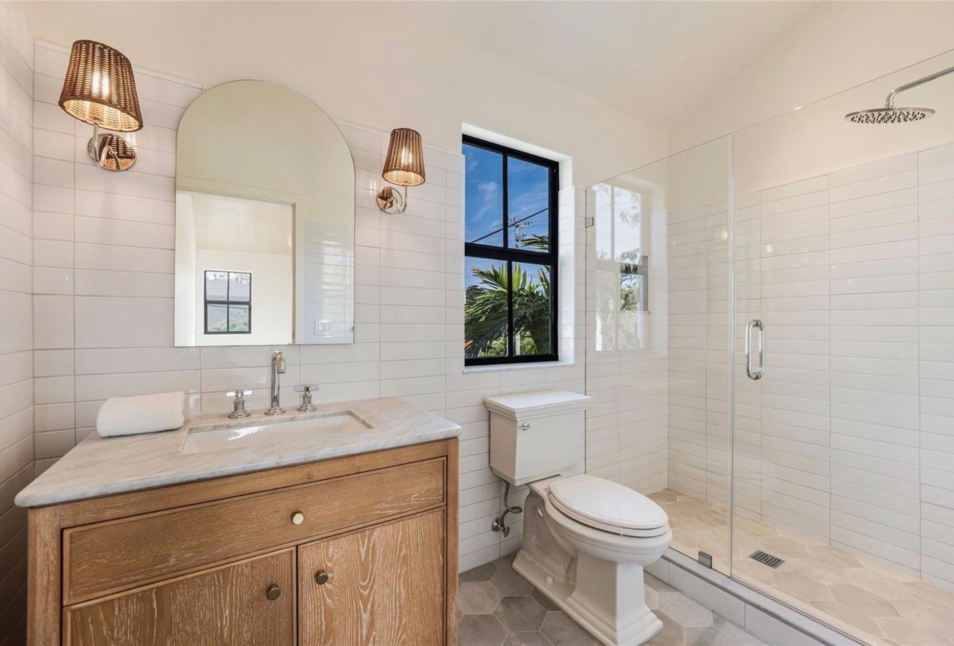 Bathroom with oak vanity and walk-in shower